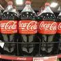 FILE -This is a shelf of Coca Cola 2 liter bottles at a market in Homestead, Pa., on Monday, Feb. 24, 2025. (AP Photo/Gene J. Puskar, File)