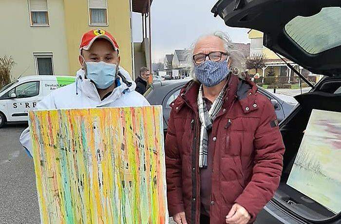 Danijel Mitar (links) mit einem kroatische Künstler, der Bilder zur Versteigerung zur Verfügung gestellt hat