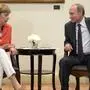 epa04313811 Russian President Vladimir Putin (R) speaks with German Chancellor Angela Merkel (L) during their meeting in Rio de Janeiro, Brazil, 13 July 2014. President Putin is on official visit in Brazil.  EPA/ALEXEY NIKOLSKY /RIA NOVOSTI / K MANDATORY CREDIT