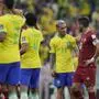 Serbia's Dusan Tadic, right, talks with Brazil's Antony at the end of the World Cup group G soccer match between Brazil and Serbia, at the Lusail Stadium in Lusail, Qatar, Thursday, Nov. 24, 2022. Brazil won 2-0. (AP Photo/Themba Hadebe)