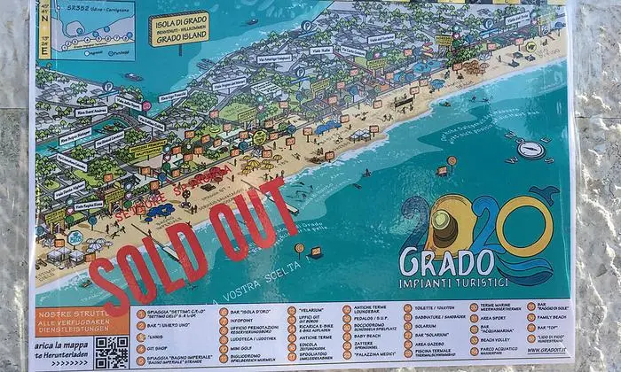 Seinen Platz am Strand von Grado muss man vorab reservieren