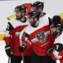 Austrian players celebrating their first goal scored by Peter Schneider, during the 2022 IIHF Ice Hockey World Championships preliminary round group B match between Sweden and Austria, in Tampere, Finland, Saturday, May 14, 2022. (Emmi Korhonen/Lehtikuva via AP)