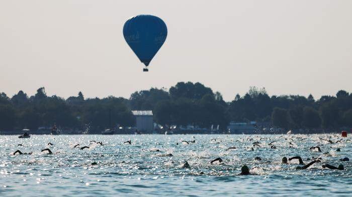  Athletes compete in the swim leg during IRONMAN Austria on June 18, 2023 in Klagenfurt, Austria