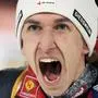 Daniel Tschofenig, of Austria, reacts after winning the 73rd Four Hills ski jumping tournament in Bischofshofen, Austria, Monday, Jan. 6, 2025. (AP Photo/Matthias Schrader)