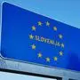 Modern Traffic road sign on blue with EU stars - Slovenija, or Slovenia construction symbol. Design element. Street information concept. Retro Highway. Transportation board frame. Sky on background