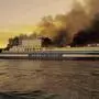 A ferry is on fire at the Ionian Sea near the island of Corfu, Greece, on Friday, Feb. 18, 2022. More than 280 people have been evacuated from the ferry in northwestern Greece that caught fire overnight, while heading to southern Italy, authorities said. (Lazos Madikos/debater.gr. via AP)