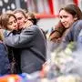 Mourners gather near the site of a fire that ripped through a bar during New Year's Eve celebrations in the Alpine ski resort town of Crans-Montanal killing around 40 people and injuring more than 100 others, in Crans-Montana on January 2, 2026. Investigators raced on January 2, 2026 to identify the victims of a fire that ripped through a bar in the Swiss Alps town of Crans-Montana, turning a New Year's celebration into one of the country's worst tragedies. Frederic Gisler, police commander in the Wallis canton in southwestern Switzerland, told reporters that authorities had counted "around 40 people who have died and around 115 injured, most of them seriously". (Photo by MAXIME SCHMID / AFP)