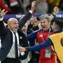 Spain's head coach Luis de la Fuente (L) celebrates with his assistants after winning at the end of the UEFA Euro 2024 final football match between Spain and England at the Olympiastadion in Berlin on July 14, 2024. (Photo by INA FASSBENDER / AFP)