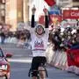 Slovenia's Tadej Pogacar of the UAE Emirates team crosses the finish line to win the Belgian cycling classic and UCI World Tour race Liege Bastogne Liege, in Liege, Belgium, Sunday, April 21, 2024. (AP Photo/Geert Vanden Wijngaert)