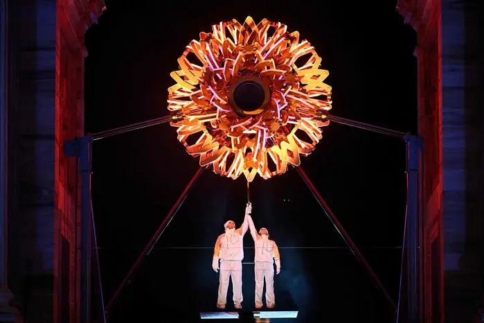 Das olympische Feuer in Mailand und Cortina brennt seit vergangenem Freitag.