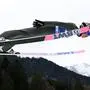 Norway's Halvor Egner Granerud soars through the air during a training jump for the second stage of the Four-Hills tournament (Vierschanzentournee) that is part of the FIS Ski Jumping World Cup, in Garmisch-Partenkirchen, southern Germany, on December 31, 2023. (Photo by KERSTIN JOENSSON / AFP)