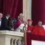 Pope Leo XIV addresses the crowds as he appears on the balcony of St Peter's Basilica after his election, at the Vatican, Thursday, May 8, 2025. (AP Photo/Gregorio Borgia)