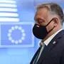 Hungary's Prime Minister Viktor Orban leaves at the end of the two days face-to-face European Union (EU) summit at the European Council Building in Brussels, on October 16, 2020. (Photo by JOHANNA GERON / POOL / AFP)