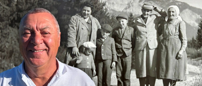 Frank mit seinem Polo-Shirt, dahinter ein Bild mit der Familie in Villach 1960