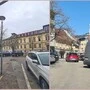 Am Bild sieht man parkende Autos und eine Laterne