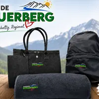 Steuerberg-Rucksack, -Filztasche oder -Strandtuch gefällig? Die Gemeinde setzt auf Merchandising-Artikel