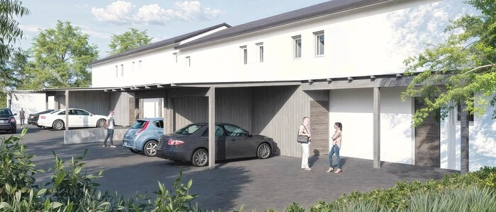 Eine Visualisierung des Projekts. Zu sehen ist eine weiße Reihenhausanlage.
