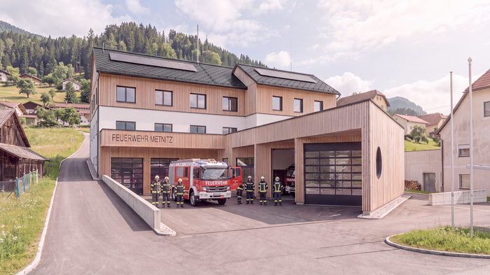 Ein neues Gebäude mit einer Holzfassade und hellen Wänden.
