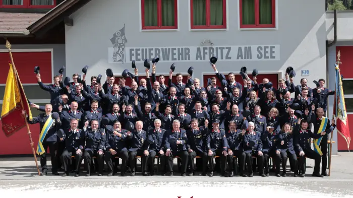 Ein Gruppenfoto einer Feuerwehr in Uniform