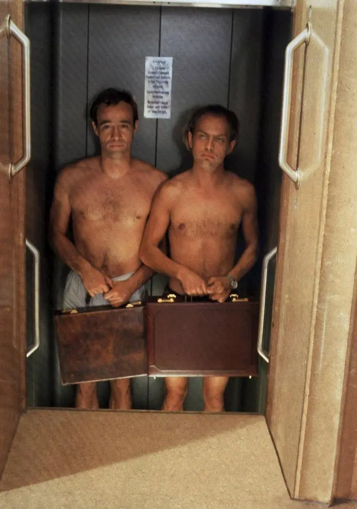  Männer, MÄNNER D 1985, Regie: Doris Dörrie, HEINER LAUTERBACH, UWE OCHSENKNECHT, Stichwort: Lift, Aufzug, Paternoster, Aktenkoffer, Mann  UnitedArchives00008537