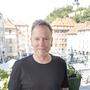 Kiefer Sutherland zu Besuch im Grazer Rathaus, im Hintergrund der Hauptplatz