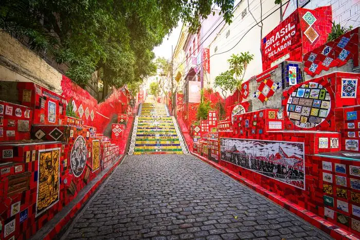 Selaron  Stairs  (Escadaria  Selaron)  is  a  popular  tourist  attraction  by  Chilean  artist  Jorge  Selaron. xkwx santa  teresa,  selaron  stairs,  escadaria  selaron,  travel,  rio  de  janeiro,  lapa,  brazil,  colorful,  architecture,  tile,  chilean,  chile,  selaron,  red,  urban,  tourist,  city,  arts,  culture,  destination,  empty,  famous,  historical,  iconic,  landmark,  latin  america,  neighborhood,  saturated,  staircase,  stairs,  steps,  tourism,  tourist  attraction,  attraction,  tour,  masterpiece,  artwork,  art,  outdoor,  brazilian,  latin