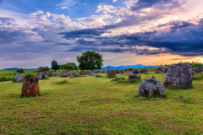 Plain of Jars is a megalithic archaeological landscape. Xieng Khouang Province, Laos. Model Released Property Released xkwx plain archaeological ancient xieng stone grave cordillera megalithic jars famous age asia asian archaeology history historical place plateau park phonsavan travel outdoors old rock khouang laos war tourist unesco heritage indochina hai landscape