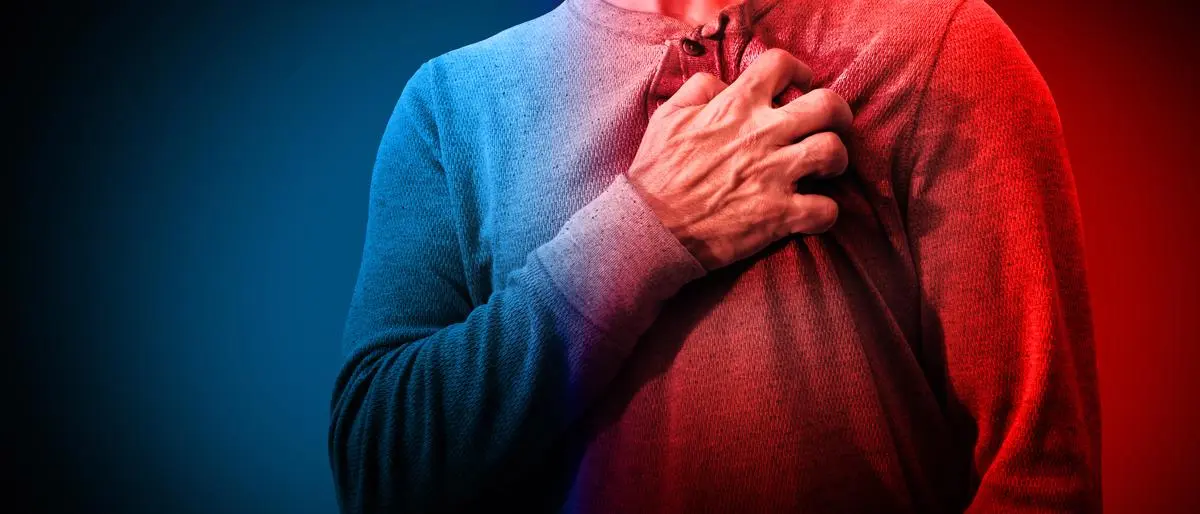 Chest pain and stressful panic attack medical issue concept as a symbol for angina or blocked blood flow resulting in a heart attack or Myocardial Infarction or Pulmonary Embolism.