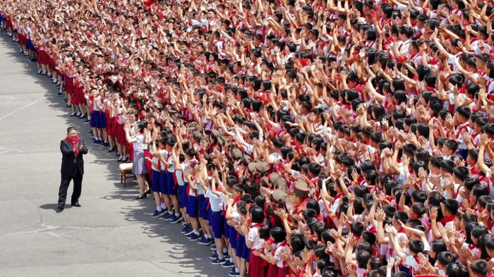 This picture taken on June 6, 2026 and released by North Korea's official Korean Central News Agency (KCNA) via KNS on June 7, 2026, shows North Korean leader Kim Jong Un attending the 80th anniversary celebration of the founding of the Korean Children's Union at Kim Il-sung Stadium in Pyongyang. (Photo by KCNA VIA KNS / AFP) / South Korea OUT / ---EDITORS NOTE--- RESTRICTED TO EDITORIAL USE - MANDATORY CREDIT "AFP PHOTO/KCNA VIA KNS" - NO MARKETING NO ADVERTISING CAMPAIGNS - DISTRIBUTED AS A SERVICE TO CLIENTS / THIS PICTURE WAS MADE AVAILABLE BY A THIRD PARTY. AFP CAN NOT INDEPENDENTLY VERIFY THE AUTHENTICITY, LOCATION, DATE AND CONTENT OF THIS IMAGE --- /