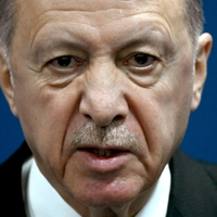 (FILES) Turkey's President Recep Tayyip Erdogan gives a press conference during the G20 Leaders' Meeting in Rio de Janeiro, Brazil, on November 19, 2024. A top adviser to Recep Tayyip Erdogan said the Turkish leader would run again in an early election likely to be held in April 2028, media outlets reported on September 17, 2026. (Photo by Luis ROBAYO / AFP)