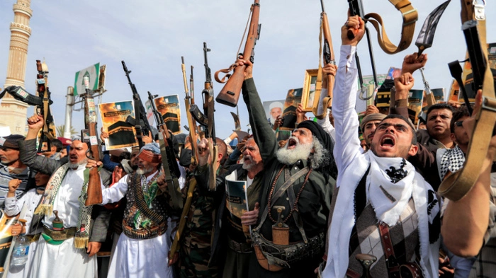 Supporters of the Iranian-backed Huthi movement gather at a mass rally, denouncing what they perceive to be derogatory comments by the US president regarding the Muslim holy city of Mecca, in Yemen's Huthi-held capital Sanaa on June 16, 2026. US President Donald Trump had on June 13 had .criticised the presidential library of his predecessor, Democrat Barack Obama, saying "ten years from now [it] will be a 'Mecca' for those who hate America!", drawing backlash from conservative Muslims... .He said Monday that loaded oil tankers were moving out of the strait, apparently on a route near to Oman, in a post on his Truth Social platform. (Photo by Mohammed HUWAIS / AFP)