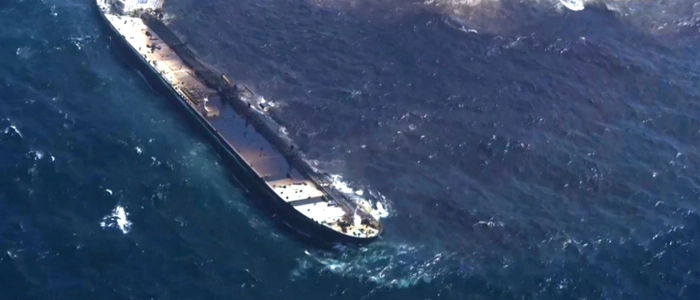 This image grab from aerial footage released by Oman TV on August 14, 2026, shows an oil leak from the Russian tanker Caroline Bezengi, which ran aground near al-Qibliyah Island off the southern coast of Oman, several weeks after the vessel was abandoned following an explosion. An oil spill from a tanker that ran aground off Oman on June 30 has reached the coastline, state media reported, while monsoon winds were obstructing containment efforts, the United Nations' maritime agency said on August 12. (Photo by OMAN TV / AFP) / RESTRICTED TO EDITORIAL USE - MANDATORY CREDIT "AFP PHOTO / OMAN TV / HANDOUT / " - NO MARKETING NO ADVERTISING CAMPAIGNS - DISTRIBUTED AS A SERVICE TO CLIENTS