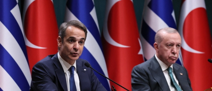 Greek Prime Minister Kyriakos Mitsotakis (L) addresses the media during a joint press conference with Turkish President Recep Tayyip Erdogan (R) at the Presidential Complex in Ankara, on February 11, 2026. (Photo by Adem ALTAN / AFP)