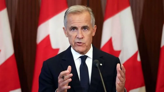 Canadian Prime Minister Mark Crney speaks at a press conference in Ottawa, Ontario, on August 22, 2026 after trade talks with the US collapsed. Carney said his country could not accept US terms for a trade deal, and would slap retaliatory tariffs on steel and dairy products in response to heavy duties imposed by Washington. "We cannot accept what they've offered, and we will not give what they've asked," Carney said in remarks on the failed negotiations, adding that Ottawa's new trade measures would take effect on September 8. (Photo by Dave Chan / AFP)