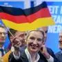 Leader of far right AfD Alice Weidel waves a German flag at the AfD party headquarters in Berlin, Germany, Sunday, Feb. 23, 2025, after the German national election. (AP Photo/Michael Probst)