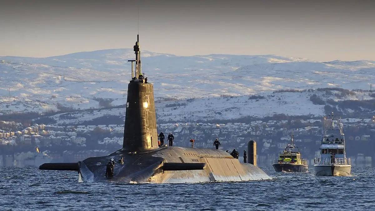 Nuclear submarine HMS Vanguard arrives back at HM Naval Base Clyde, Faslane, Scotland following a patrol.