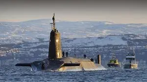 Nuclear submarine HMS Vanguard arrives back at HM Naval Base Clyde, Faslane, Scotland following a patrol.