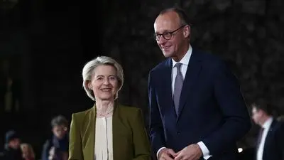 German Chancellor Friedrich Merz welcomes President of the European Commission Ursula von der Leyen at the Chancellery in Berlin, Germany, Monday, Dec. 15, 2025. (AP Photo/Maryam Majd)
