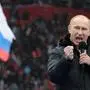 (FILES) Russian Presidential candidate, Prime Minister Vladimir Putin delivers a speech during a rally of his supporters at the Luzhniki stadium in Moscow on February 23, 2012. Russian leader Vladimir Putin has decided to run in presidential elections next March, news agencies reported on December 8, 2023, allowing the Kremlin leader to extend his decades-long grip on power. (Photo by Yuri KADOBNOV / AFP)