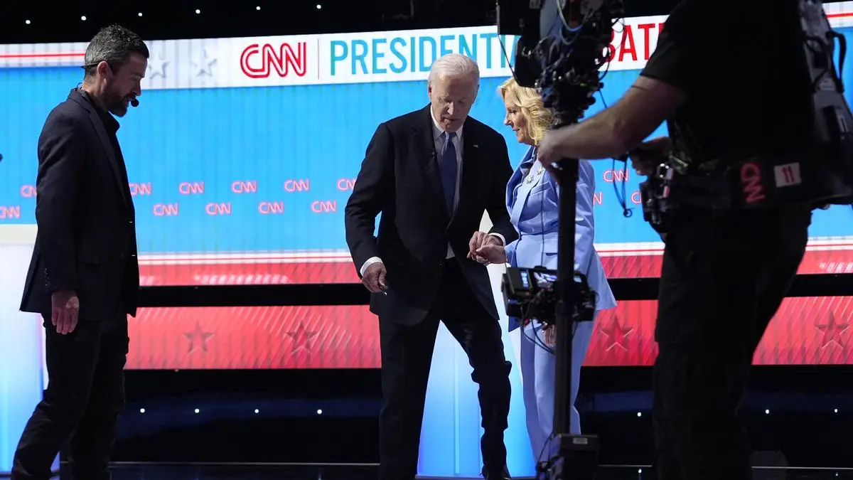 President Joe Biden, from second left, and first lady Jill Biden, walk off stage at the conclusion of a presidential debate with Republican presidential candidate former President Donald Trump hosted by CNN, Thursday, June 27, 2024, in Atlanta. (AP Photo/Gerald Herbert)