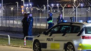 The Danish police are seen at Copenhagen Airport, in Kastrup near Copenhagen, on September 22, 2025. Danish police said on September 23, 2025 they did not know who was responsible for flying drones over Copenhagen airport the previous evening, but that they appeared to have been knowledgeable. "The number, size, flight patterns, time over the airport. All this together ... indicates that it is a capable actor. Which capable actor, I do not know," police inspector Jens Jespersen told reporters. The airport was closed for several hours before reopening early Tuesday, causing numerous delays and travel disruptions to 20,000 passengers, airport officials said. (Photo by Steven Knap / Ritzau Scanpix / AFP) / Denmark OUT