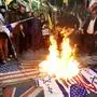 Iranians burn Israeli and US flags during a protest at Palestine square in Tehran, on April 1, 2024. Israeli air strikes destroyed the Iranian embassy's consular annex in Damascus on April 1, Syrian and Iranian officials said, with a top Revolutionary Guard commander among eight reported to have been killed amid worsening regional tensions. (Photo by AFP)
