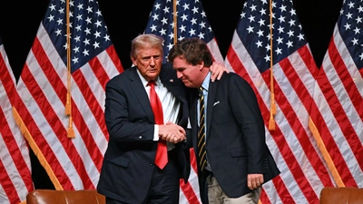 Ein Bild aus besseren Tagen: Tucker Carlson mit Donald Trump