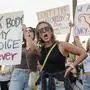 Abortion rights protesters chant during a Pro Choice rally at the Tucson Federal Courthouse in Tucson, Arizona on Monday, July 4, 2022. (Photo by SANDY HUFFAKER / AFP)