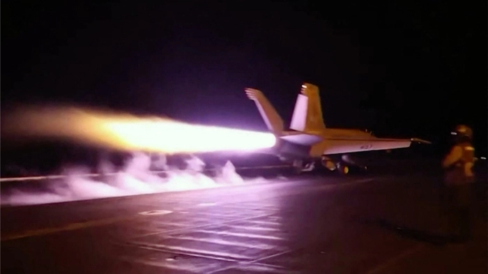 This screen grab made on July 22, 2026 from handout video footage released by the US Central Command (CENTCOM) on July 21, 2026 shows US forces launching what the military says are precision strikes targeting Iranian military capabilities for the eleventh consecutive night. Fresh US strikes triggered air defences in Tehran on July 22 after President Donald Trump warned he was "not finished" with a war with Iran that has already cost his nation $37.5 billion. (Photo by US Central Command (CENTCOM) / AFP) / THIS PICTURE WAS BLURRED AT SOURCE --- RESTRICTED TO EDITORIAL USE - MANDATORY CREDIT "AFP PHOTO / US CENTRAL COMMAND (CENTCOM)" - HANDOUT - NO MARKETING NO ADVERTISING CAMPAIGNS - DISTRIBUTED AS A SERVICE TO CLIENTS