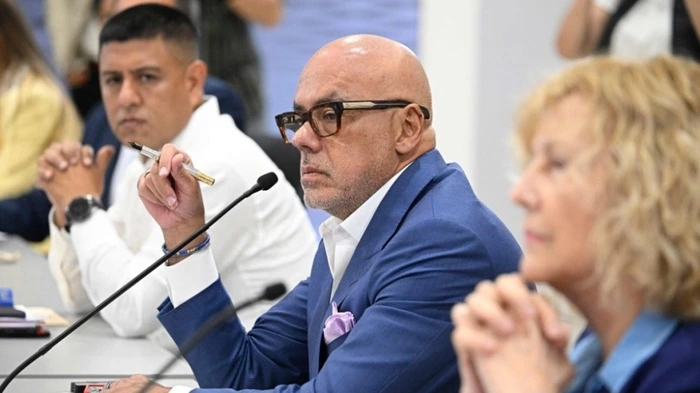Venezuelan National Assembly President Jorge Rodriguez gestures during a launch of Venezuela's political dialogue process at the Conventions Center in La Carlota neighborhood, Sucre municipality, Caracas on August 6, 2026. US-backed political transition talks between Venezuela's interim government and opposition representatives began on August 6, 2026 in Caracas, an AFP photographer in attendance observed. (Photo by Federico PARRA / AFP)