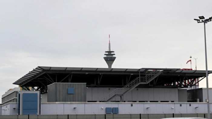 The Rhine Tower is seen behind a building of the Duesseldorf Higher Regional Court in Duesseldorf, western Germany, on May 27, 2025, prior to the start of a trial against a Syrian man charged with the Solingen knife attack. Defendant Issa Al H is on trial for three counts of murder, ten counts of attempted murder and membership of the jihadist militia Islamic State (IS). According to the federal prosecutor, the accused attacked several visitors at a city festival in Solingen with a knife on August 23, 2024. Three people died and ten others were injured. (Photo by INA FASSBENDER / AFP)