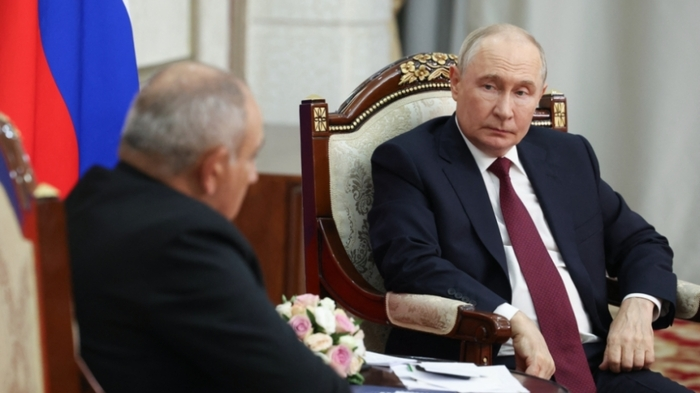 In this pool photograph distributed by the Russian state agency Sputnik, Russia's President Vladimir Putin and Armenian Prime Minister Nikol Pashinyan hold a meeting on the sidelines of the Shanghai Cooperation Organisation (SCO) summit in Bishkek on September 1, 2026. (Photo by Vyacheslav PROKOFYEV / POOL / AFP)