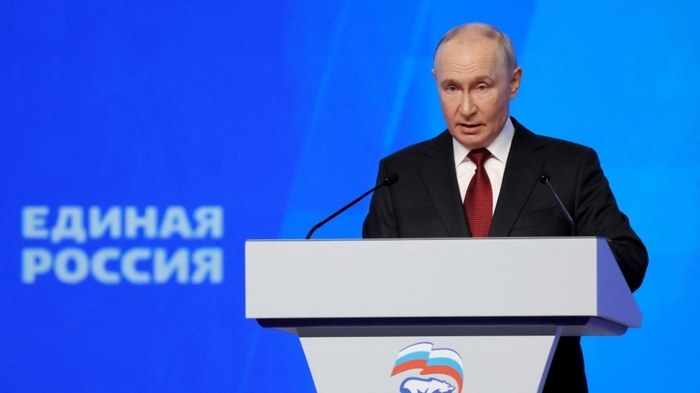 In this pool photograph distributed by the Russian state agency Sputnik, Russian President Vladimir Putin speaks at the second stage of the 23rd Congress of the United Russia party at the Megasport Arena in Moscow on August 22, 2026. (Photo by Yekaterina SHTUKINA / POOL / AFP)