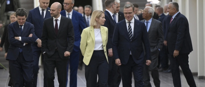EU foreign policy chief Kaja Kallas (C) and Finnish Prime Minister Petteri Orpo (R) chat as they arrive with other European leaders for the first working session of the European Arctic Summit at the Arktikum science centre in Rovaniemi, Finland, on September 14, 2026. EU leaders meet in Finland's northern city of Rovaniemi to discuss how to strengthen the bloc's presence in the Arctic amid an international showdown over the strategic region. US President Donald Trump's repeated threats to bring Greenland -- an autonomous Danish territory -- under US control, has triggered a diplomatic crisis among allies. (Photo by Jouni Porsanger / Lehtikuva / AFP) / Finland OUT